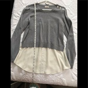 Cute cropped sweater with faux cream shirt tail